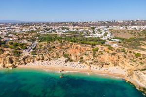 an aerial view of a beach in positano at Kimpton Atlantico Algarve by IHG in Albufeira +109 photos