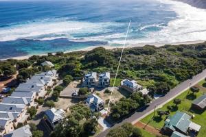 an aerial view of houses and the ocean at Yallingup Lagoon Beach House in Yallingup