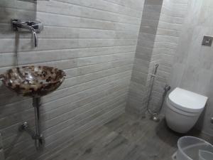 Koupelna v ubytování Hotel Sapna
