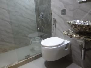 Koupelna v ubytování Hotel Sapna