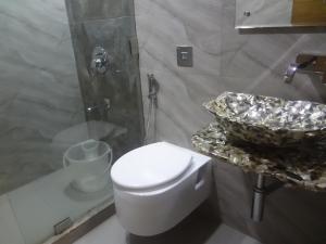 Koupelna v ubytování Hotel Sapna