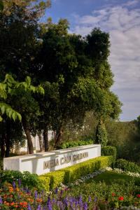 a sign for the miami calanta colombia at Meliá Cala Galdana in Cala Galdana