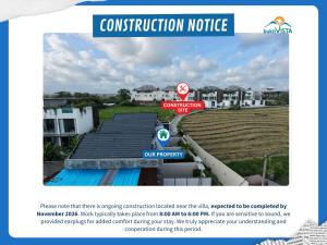 a sign that is on top of a building at Villa Lyma by Bukit Vista in Pererenan
