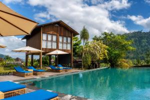 a villa with a swimming pool at a resort at Kropak Sidemen in Sidemen