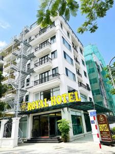 a hotel building with a royal hotel sign on it at Royal Hotel Lâm Hạ in Hanoi