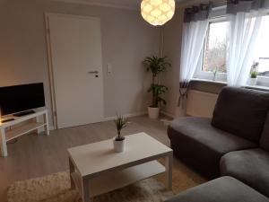 Χώρος καθιστικού στο Ferienhaus am Hasselberg Husum