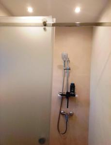 a bathroom stall with a shower with a shower at Gästehaus Josef Lang in Andau
