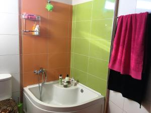 a bathroom with a sink and a shower at The Olive Tree House in Kompítsion +64 photos