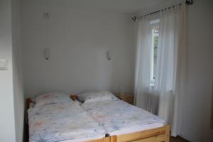 Postel nebo postele na pokoji v ubytování Ferienhaus Vera