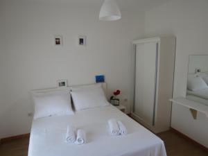 Postel nebo postele na pokoji v ubytování SD House Rooms + 33 fotografií