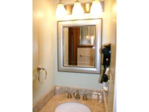 a bathroom with a sink and a mirror at Mountain View Lodge in Packwood