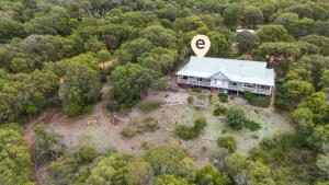 an aerial view of a house in the middle of a forest at Hillview - Spacious Bushland Haven with Resort Access in Yallingup