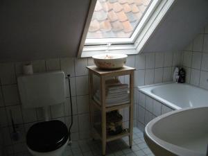 Koupelna v ubytování La Perle Apartment