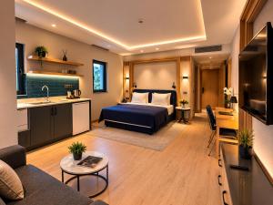 a hotel room with a bed and a kitchen at Cher Hotel Eyüp in Istanbul