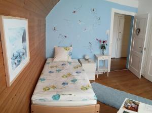 Letto o letti in una camera di B&B Kalimera Pratteln