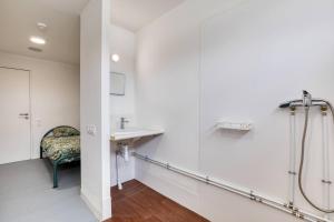 a bathroom with a shower and a sink at Résidence Arkenciel 1 in Mudaison +42 photos