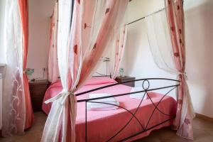 מיטה או מיטות בחדר ב-Agriturismo Sole Luna