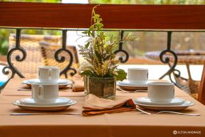 Comodidades para preparar café e chá em Terra dos Diamantes Hotel