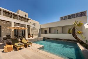 an image of a villa with a swimming pool at Meros, Santikos Collection in Naousa +72 photos