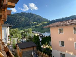 a view of a town with a mountain in the background at Landhaus Engadin in Nauders