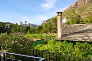 a view of the mountains from a house at Refugio La Presa in Chulilla
