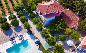 an aerial view of a house with a swimming pool at Ktima Klimentini in Vivari