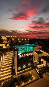 a building with a sign that reads la canaria at night at Hotel Park Elanza Coimbatore in Coimbatore
