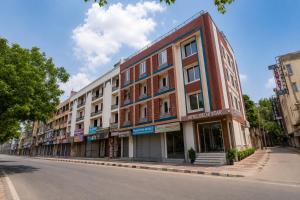 a building on the side of a street at The Delhi Star Hotel near Connaught Place- New Delhi in New Delhi