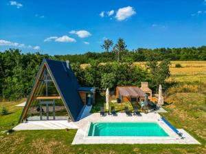 an image of a tiny house with a pool at KosMy dream in Sopot