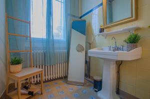 a bathroom with a sink and a mirror at L'instant champenois - all inclusive in Bréviandes +19 photos