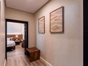 a room with a bedroom with a bed and a mirror at Marmara Boutique in Medina