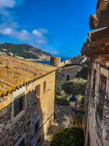 a view from a building with a view of the ocean at Casita de Mar in Tossa de Mar