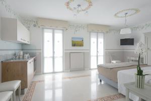 Kuchyňa alebo kuchynka v ubytovaní Gruppo Luxe Domus Vigevano