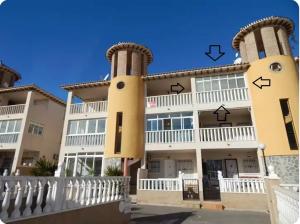 a large building with two large towers at Casa Lyngra in Orihuela Costa
