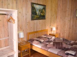 a bedroom with two twin beds and two lamps at Царів Хутір in Tsarivka +191 photos