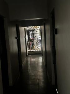 a hallway with a door leading into a building at Tsavo in Nairobi