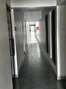 a hallway of a building with a long corridor at Tsavo in Nairobi