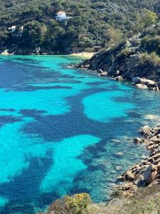 a view of the blue water of a beach at Calabianca in Giglio Porto