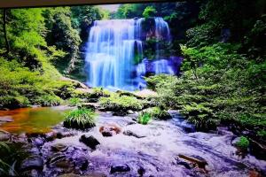 a waterfall in the middle of a stream at Downtown Condo w Huge TV in Zagreb