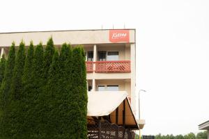 a building with a tent in front of it at Kotlina smart hotel in Rožňava