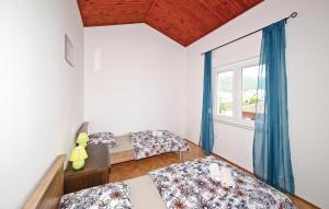Postel nebo postele na pokoji v ubytování Apartmani Ljubica
