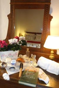 A bed or beds in a room at Fattoria Casa Sola