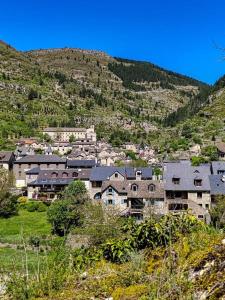 a large group of houses on a mountain at Gorge du Tarn Loft Cocoon Lesoleilo in Mostuéjouls