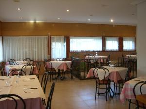 Reštaurácia alebo iné gastronomické zariadenie v ubytovaní La Muralla