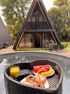 a grill with plates of food on top of a house at AFRAME Solotvino in Solotvyno