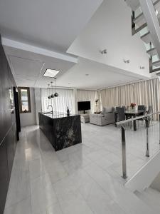 a living room with a couch and a table at Villa Capitan in Orihuela Costa