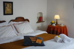 A bed or beds in a room at Fattoria Casa Sola