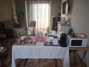 a table with food on it in a living room at La tenuta di Greta in Canino