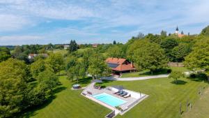 an aerial view of a house with a swimming pool at Villa Dobrenic by Villas Guide in Donje Taborište