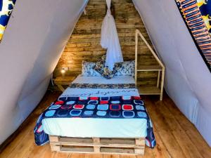 a bedroom with two beds in a attic at Arusha Jua Eco Home- on coffee farm in Arusha